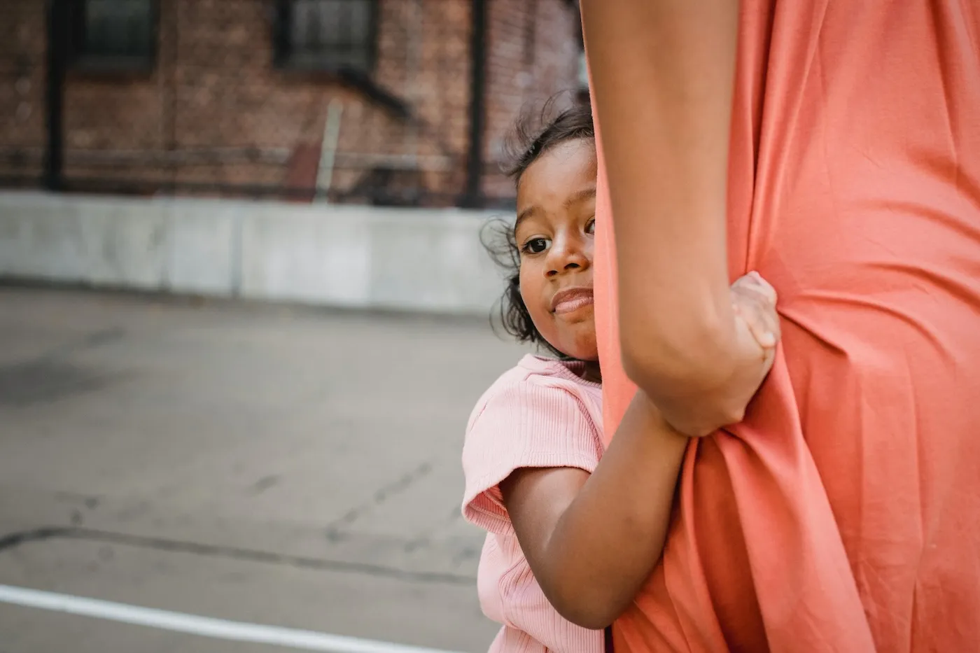 Child holding a parent’s hand