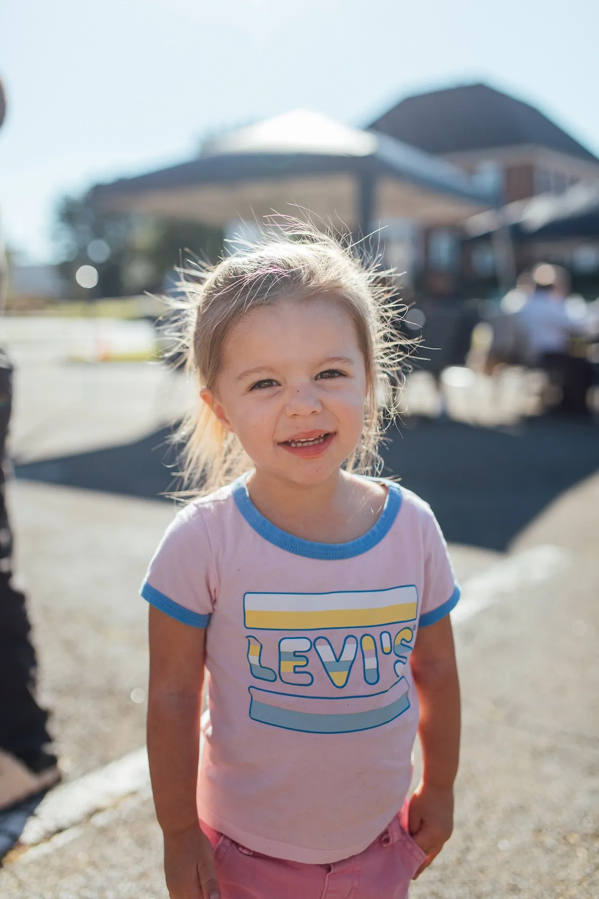 Toddler smiling at church outdoor